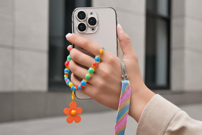 Mastering Phone Grip: Secure & Stylish Solutions with Straps, Lanyards, and Charms